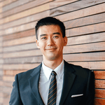 Man standing and smiling
