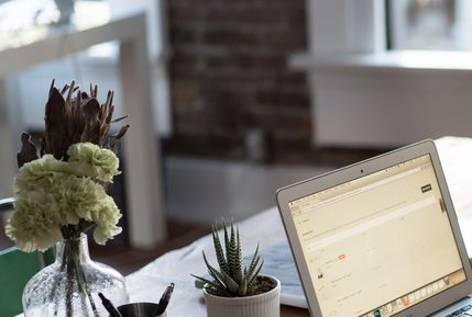 Image of a student on a computer studying