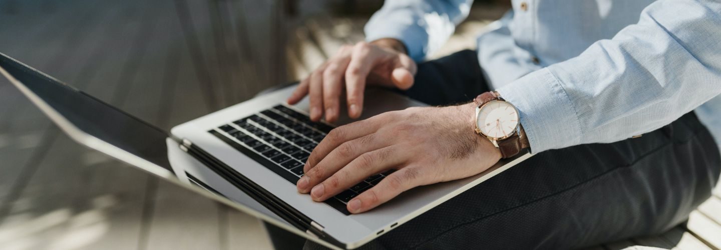 Person typing on laptop