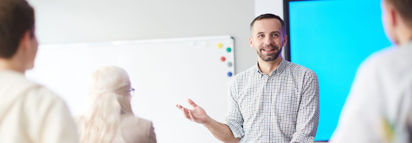 Person talking to a classroom of students